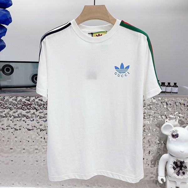 Sure to sell out: Adidas x Gucci Trefoil Print T-shirt replica guh72950 Sure to sell out: Adidas x Gucci Trefoil Print T-shirt replica guh72950