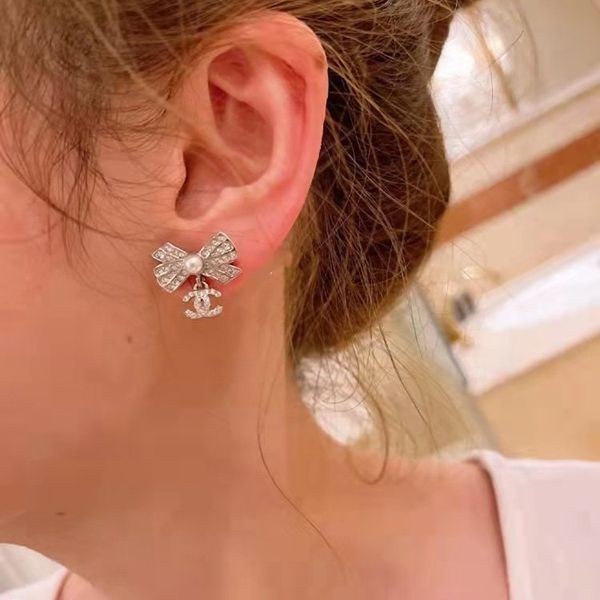 Extremely rare! Replica Chanel earrings CC logo crystal ribbon AB8004B07789NH171