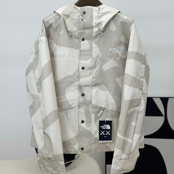 North Face Replica Kaws Retro 1986 Mountain Jacket "Moonlight Ivory" Nof68613