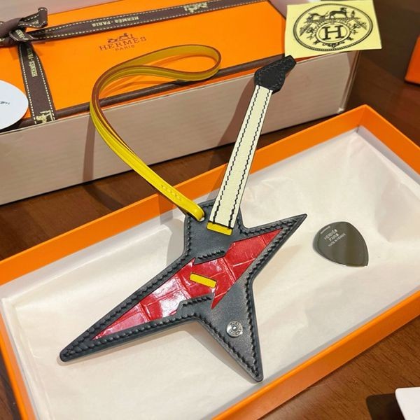 Rare! Hermes Rock Charm with Stainless Steel Guitar Pick Replica erv27541