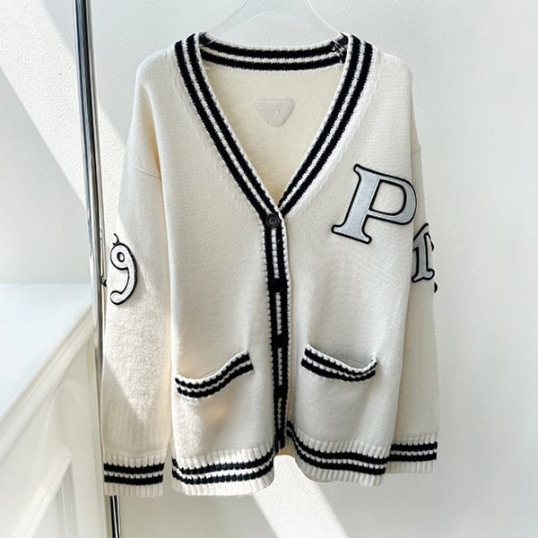 Love at first sight? Replica Prada oversized varsity cardigan with logo puc98913
