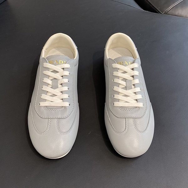 Prada Replica Embossed Lettering Logo Leather Sneakers puy54666