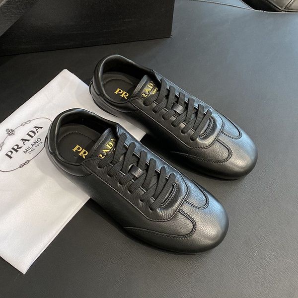 Replica Prada embossed lettering logo leather sneakers puz43660
