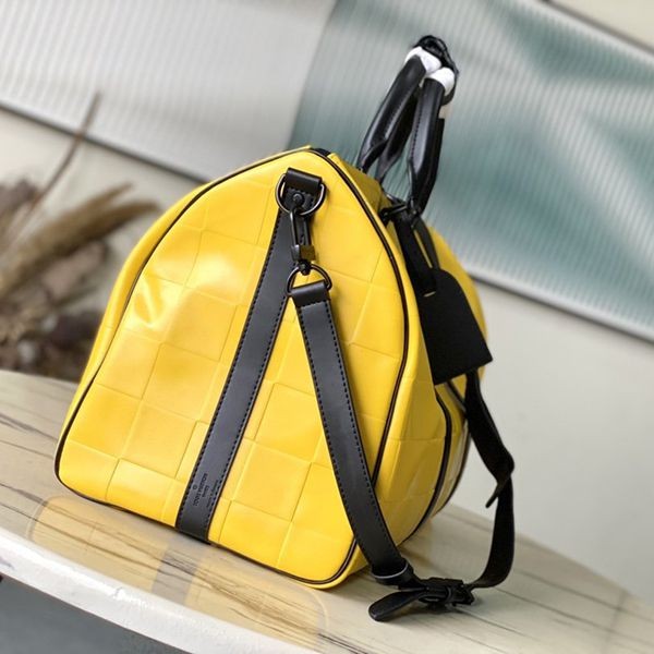 A great travel companion with a striking yellow color!Louis Vuitton Keepall 50 fake Boston bag M25019