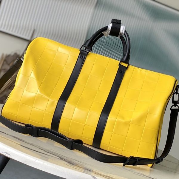 A great travel companion with a striking yellow color!Louis Vuitton Keepall 50 fake Boston bag M25019
