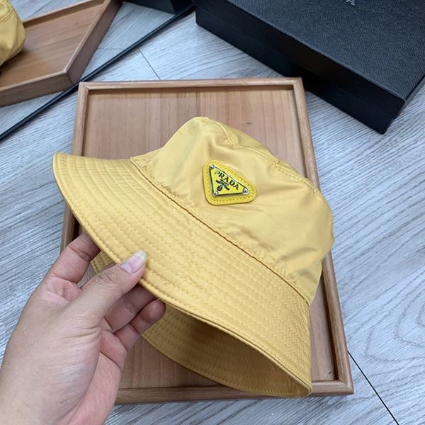 Prada nylon bucket hat replica logo plate yellow puz74021