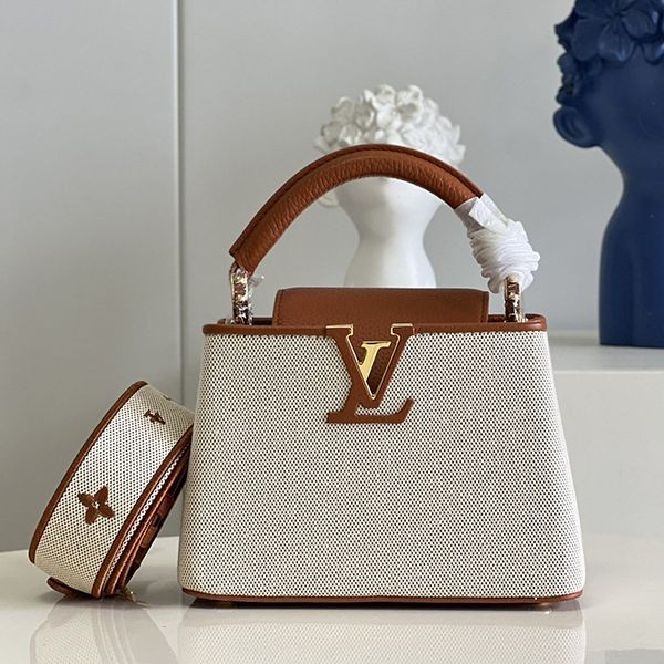 Featured in the magazine "25ans"! Louis Vuitton Capucines Replica Coquille Handbag with Strap 3 Sizes vuy68834 Featured in the magazine "25ans"! Louis Vuitton Capucines Replica Coquille Handbag with Strap 3 Sizes vuy68834