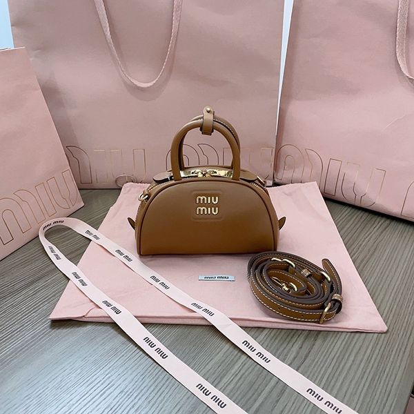 Secured Miu Miu Leather Top Handle Bag Replica myt48319