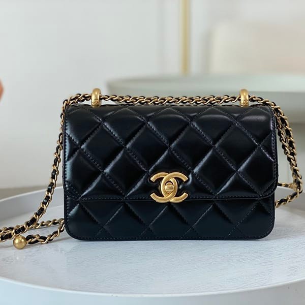 The Battle for Chanel Fake Flap Mato Bag Chain Wallet shi35496