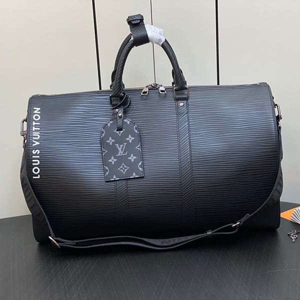 Battle for Louis Vuitton Keepall Bandouliere 50 Replica Bag vub02600 Battle for Louis Vuitton Keepall Bandouliere 50 Replica Bag vub02600