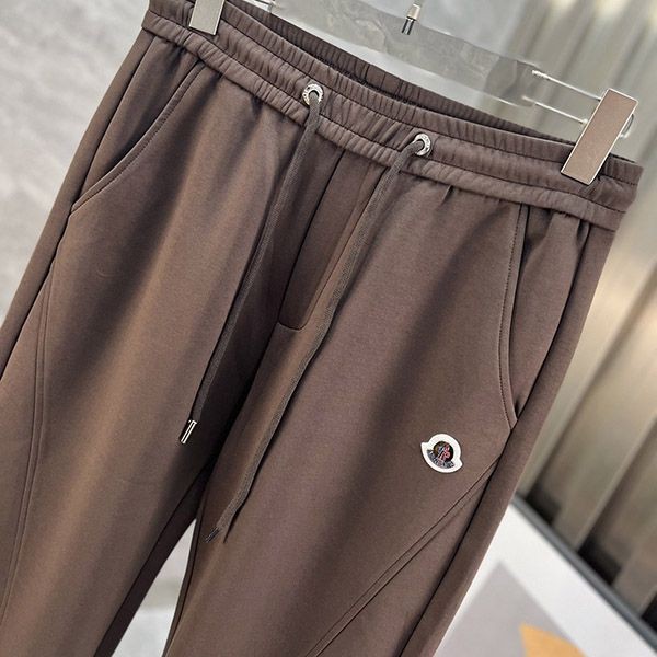 I definitely want this! Moncler sweatpants replica with logo patch moe60044