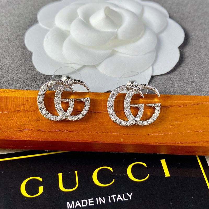 Love at first sight? Gucci/Running G 18K gold & diamond earrings replica guh47337