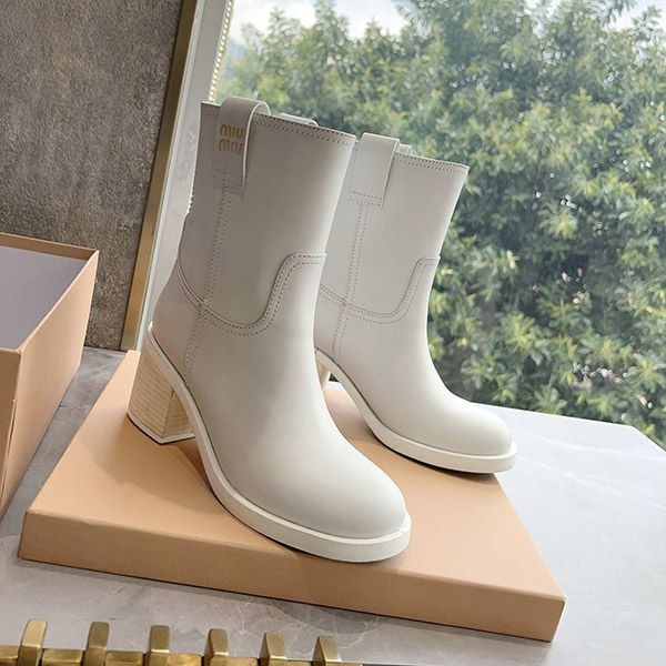 Miu Miu Oversole Leather Ankle Boots Boots mye97463