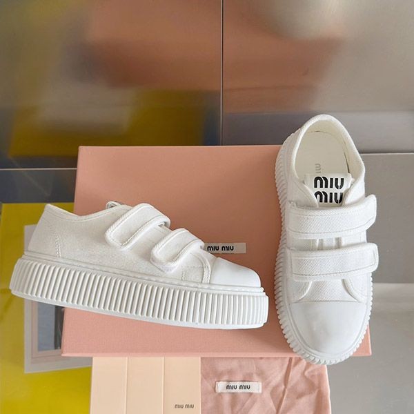 Miu Miu sneakers painted logo canvas mym86767