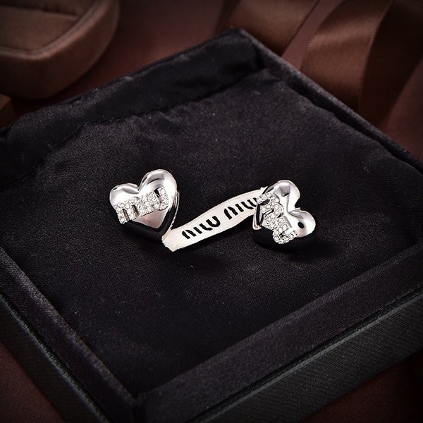 Want it? Super limited edition? Miu Miu heart logo earrings replica myu25990