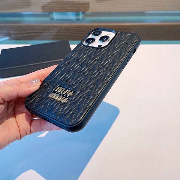 A battle for the top spot? Miu Miu fake matelassé leather iPhone 13/14 Pro case myc35241