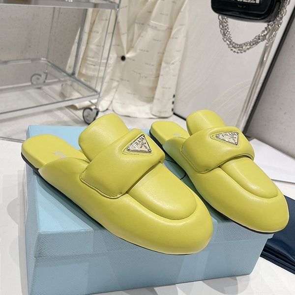 New limited edition? Prada triangle logo mules fake puv75369