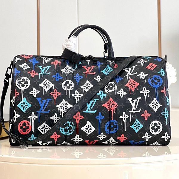 A nice Louis Vuitton Keepall Bandouliere 50 replica in multi-color M21384 A nice Louis Vuitton Keepall Bandouliere 50 replica in multi-color M21384