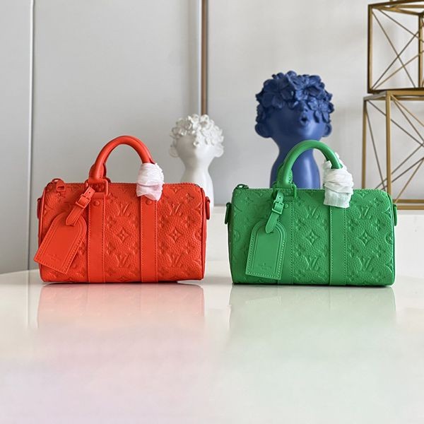 No. 1 in cumulative total sales! Louis Vuitton Keepall Bandouliere 25 replica in green and orange, 2 colors, M20929 No. 1 in cumulative total sales! Louis Vuitton Keepall Bandouliere 25 replica in green and orange, 2 colors, M20929