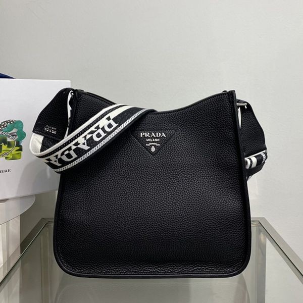 Love at first sight? Replica Prada metal letter logo leather hobo bag pug61172