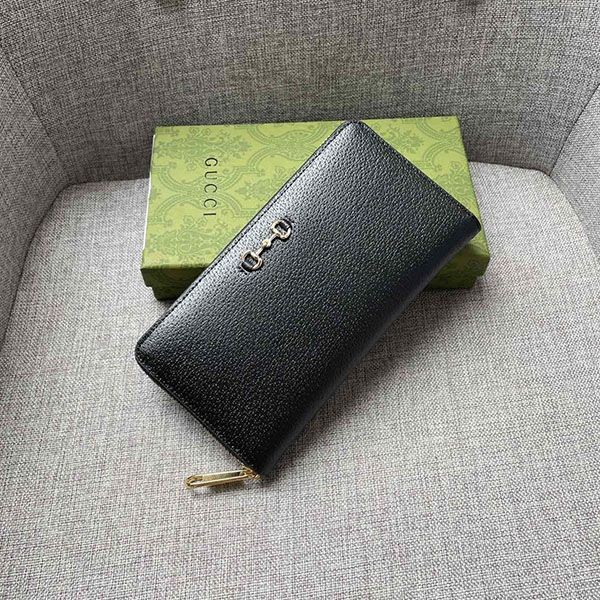 I definitely want this! Gucci Ostrich Zip Around Wallet Replica gud26582
