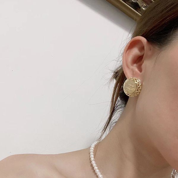 Very popular! Chanel pink gold round earrings replica sha10696 Very popular! Chanel pink gold round earrings replica sha10696