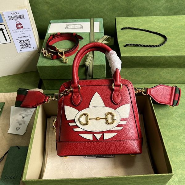Eye-catching collaboration between Adidas and Gucci, replica Horsebit 1955 mini bag gua04088 Eye-catching collaboration between Adidas and Gucci, replica Horsebit 1955 mini bag gua04088