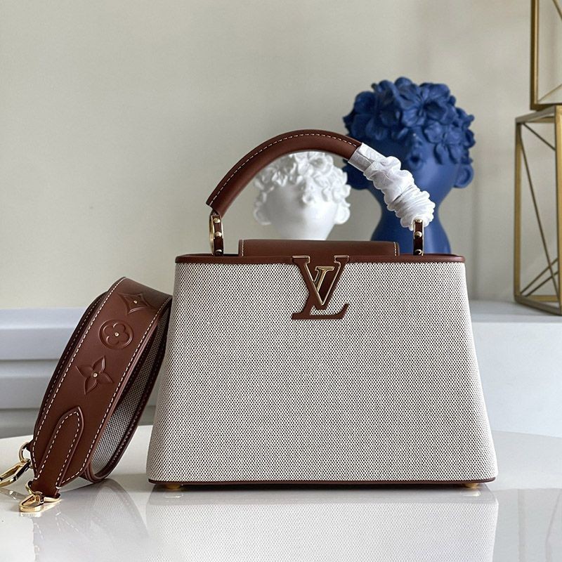 Very popular Louis Vuitton Capucines MM canvas handbag M57361