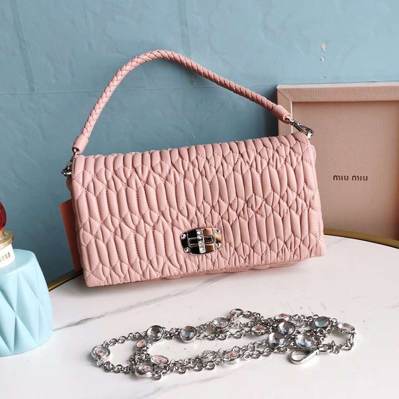 Love at first sight? Miu Miu fake matelassé shoulder bag with crystal chain mye43171