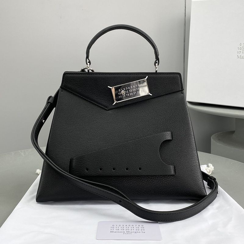 The rapidly growing Maison Margiela Snatched Medium Top Handle Bag Maw34459